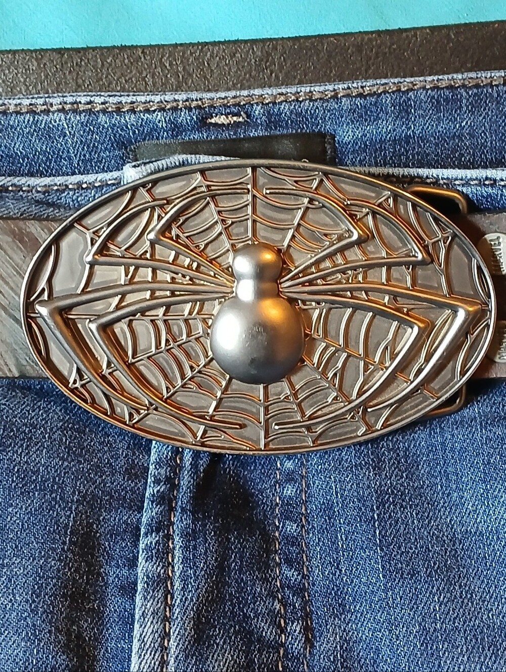 Marvel Spiderman buckle on a genuine leather belt.
